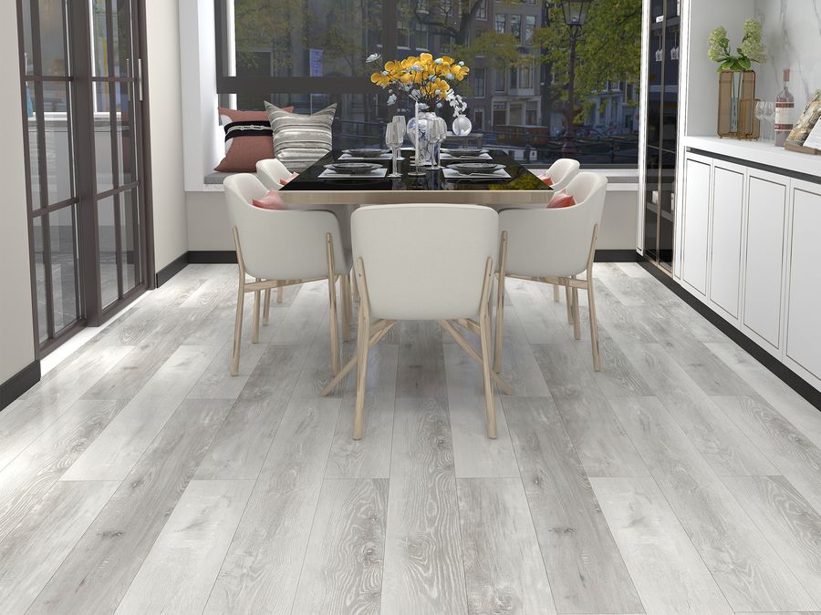 Wide plank flooring in a modern dining room