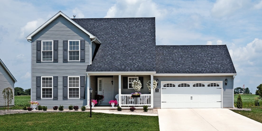 Stamped Carriage House garage door on a home