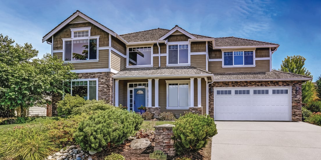 Stamped Shaker garage door on a home