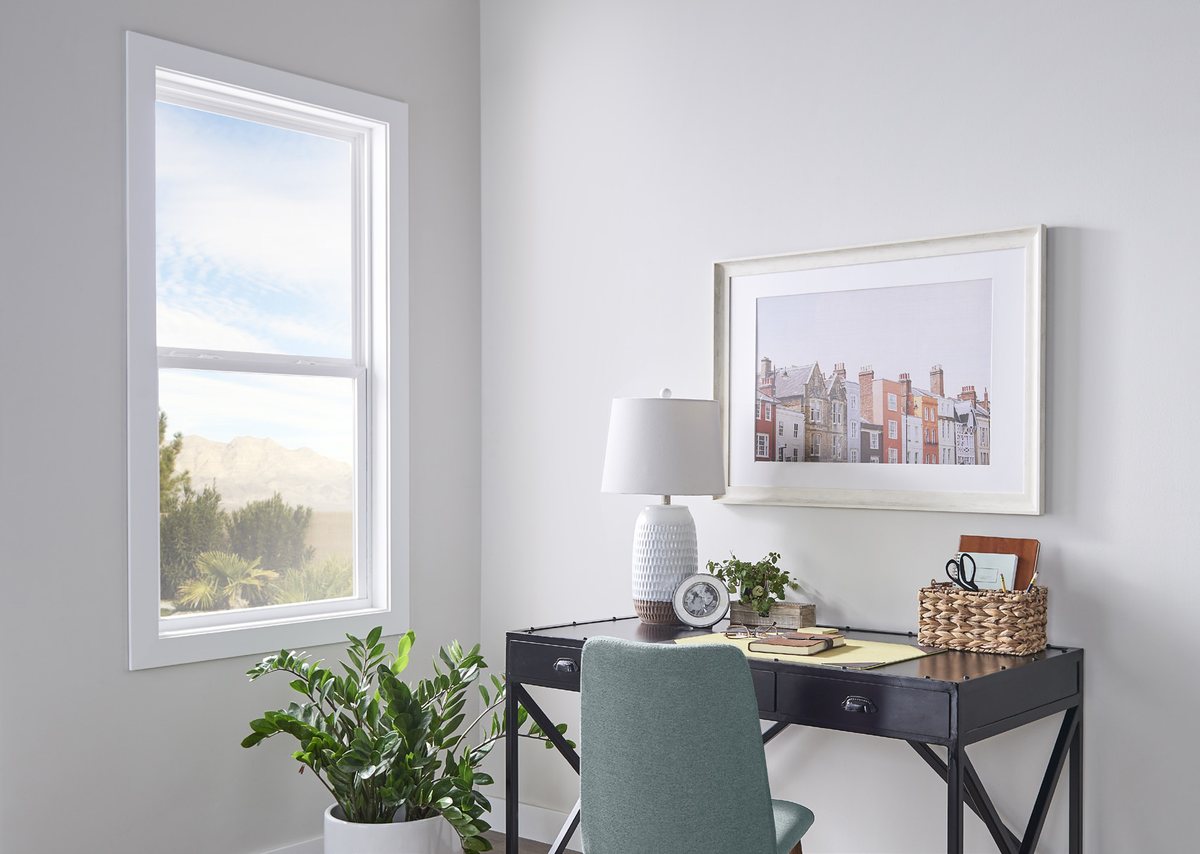 Single hung window with a fixed top sash